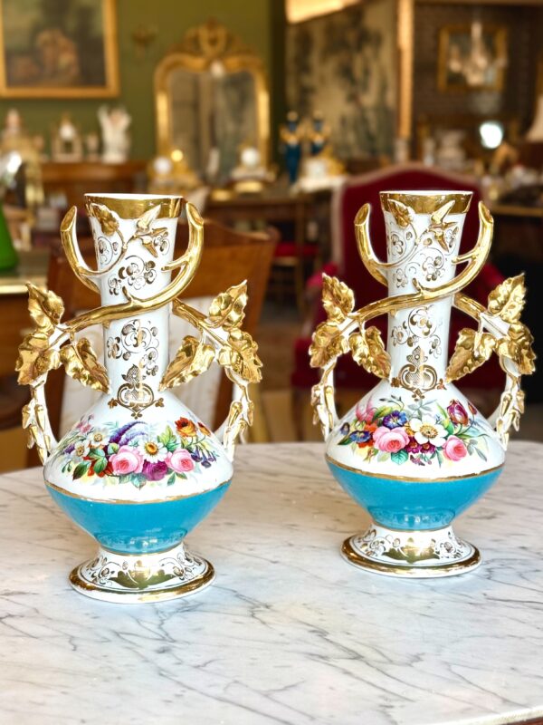 Pair of 19th C. Paris Porcelain Vases with Gilt Handles and Floral Painting