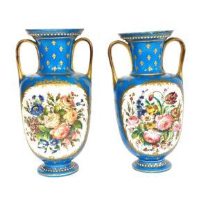 Pair of 19th Century Sèvres Porcelain Vases with Cherubs and Flowers