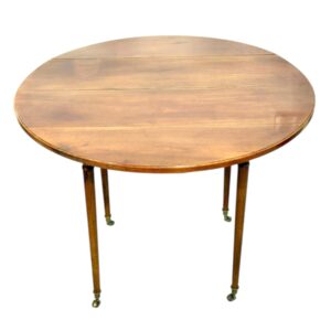 Early 19th Century French Cherrywood Drop-Leaf Table on Gilt Bronze Casters